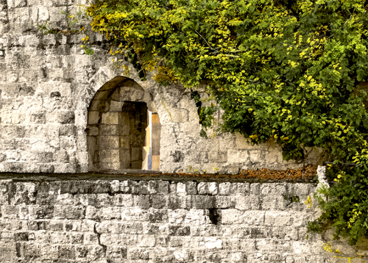 Photo watercolor of the Jewish Quarter's Dung Gate stone wall featuring an arched opening