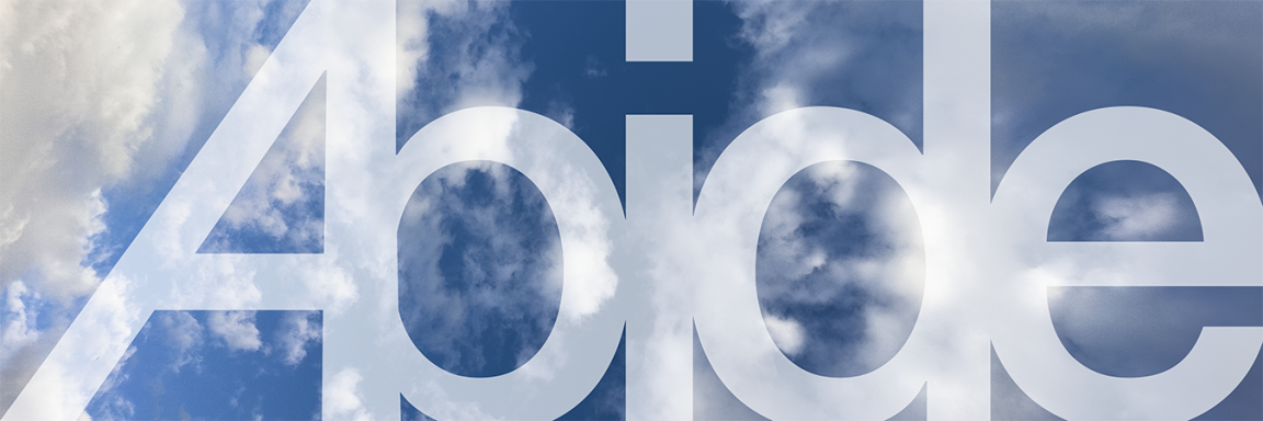 Abide in large, translucent letters overlay a blue sky with clouds